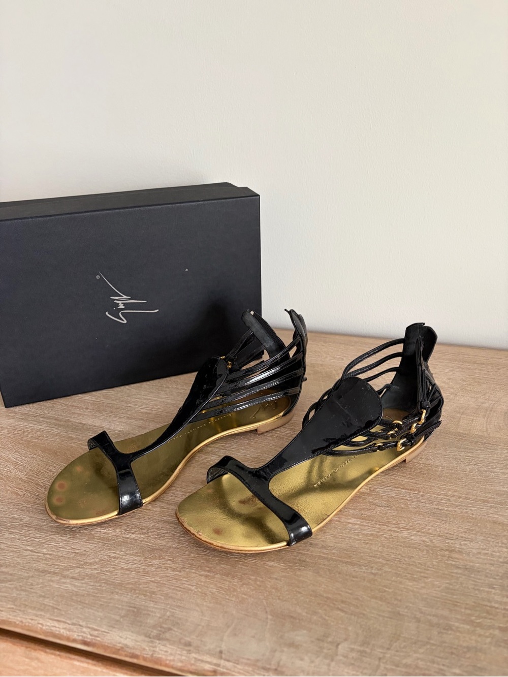 Giuseppe Zanotti Black Strappy Sandals with Gold Footbed